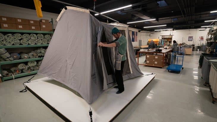 Springbar employee Nate Nelson inspecting the Traveler model at the factory in Salt Lake City. (Photo: Dan Ransom)