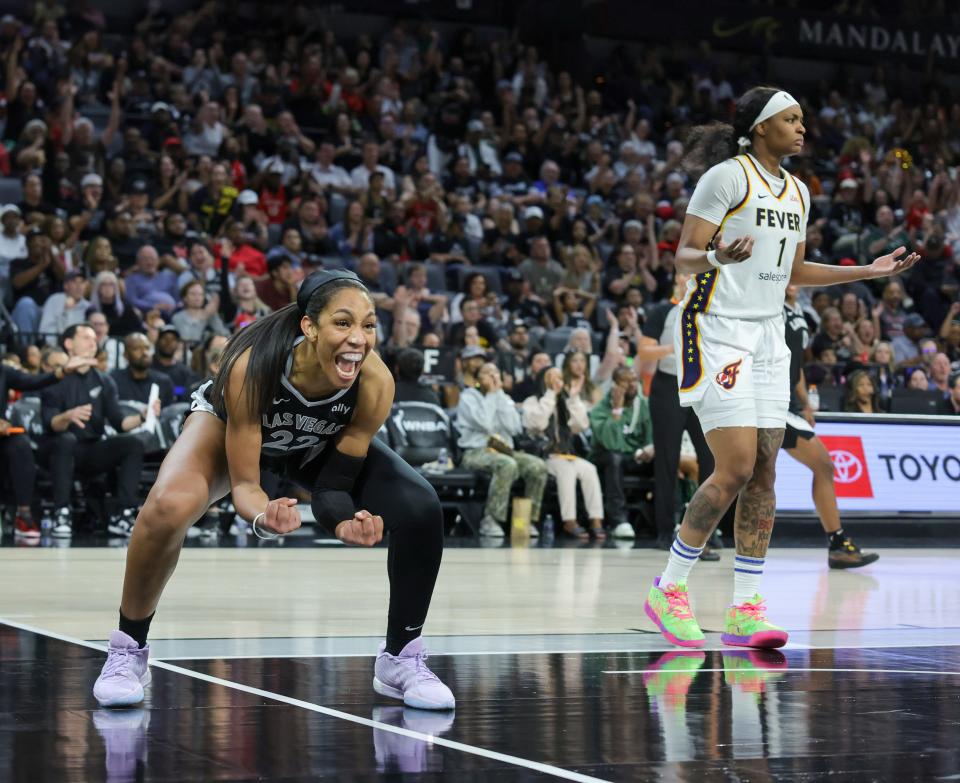 A'ja Wilson #22 of the Las Vegas Aces reacts after making a basket and drawing a foul against the Indiana Fever in the third quarter of their game at Michelob ULTRA Arena on May 25, 2024 in Las Vegas, Nevada.