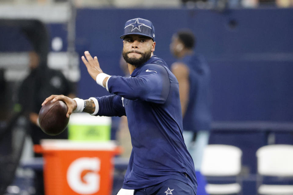 Dallas Cowboys quarterback Dak Prescott warms up for the team's preseason NFL football game against the Las Vegas Raiders in Arlington, Texas, Saturday, Aug. 26, 2023. (AP Photo/Michael Ainsworth)