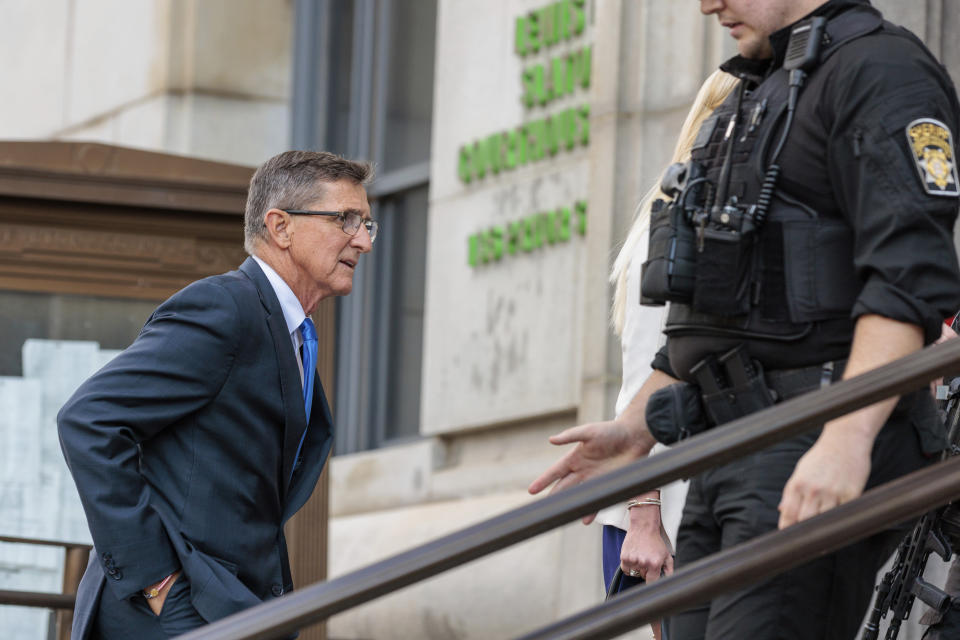 Michael Flynn, former President Donald Trump's onetime national security advisor, appears at the Fulton County Courthouse to testify before a special grand jury in Atlanta, Thursday, Dec. 8, 2022. The special grand jury is probing whether Trump and his allies criminally interfered in Georgia's 2020 elections. (Arvin Temkar/Atlanta Journal-Constitution via AP)