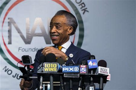 Reverend Al Sharpton speaks during a news conference held to address local media reports regarding his relationship with the FBI during the 1980s in New York April 8, 2014. REUTERS/Lucas Jackson