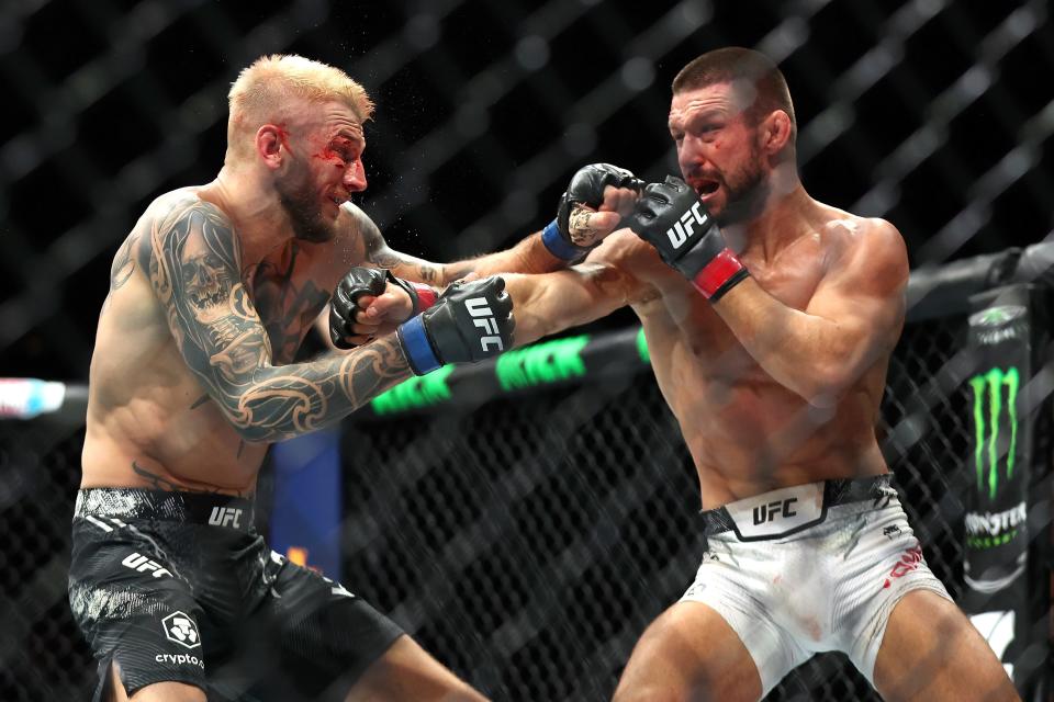 PERTH, AUSTRALIA - AUGUST 18: Dan Hooker of New Zealand fights Mateusz Gamrot of Poland in the Lightweight Bout during UFC 305 at RAC Arena on August 18, 2024 in Perth, Australia. (Photo by Paul Kane/Getty Images)