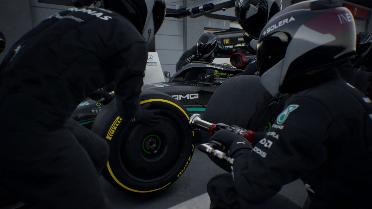  Pit crew working on an F1 car. 