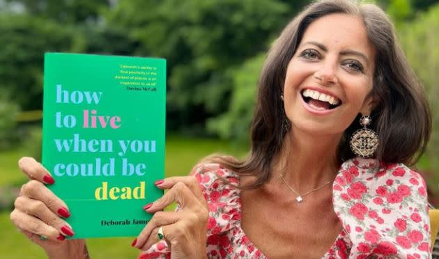 Deborah James with her book, How To Live When You Could Be Dead. (Photo: Deborah James / Ebury)
