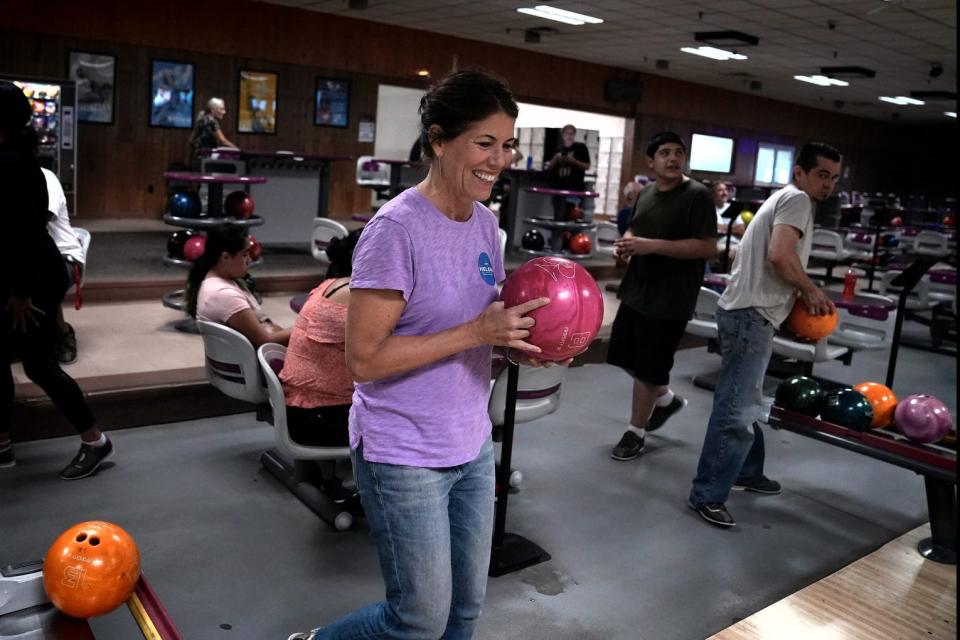 Rhode Island candidate for governor Helena Foulkes bowls with campaign staffers at East Providence Lanes recently.