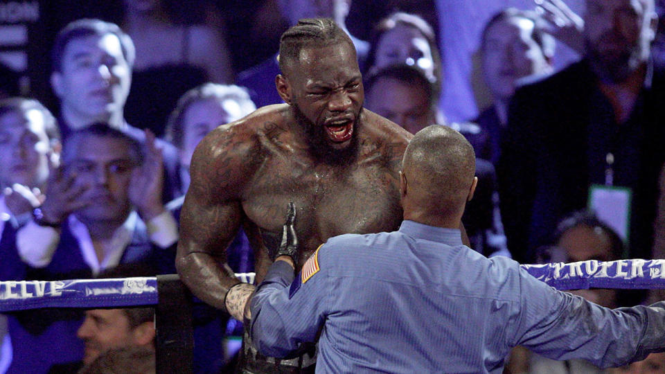 Seen here, Deontay Wilder reacts angrily to his seventh round TKO loss to Tyson Fury. 