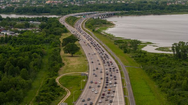 <p>Getty</p> Heavy traffic on Belt Parkway, Jamaica Bay, Canarsie Park.