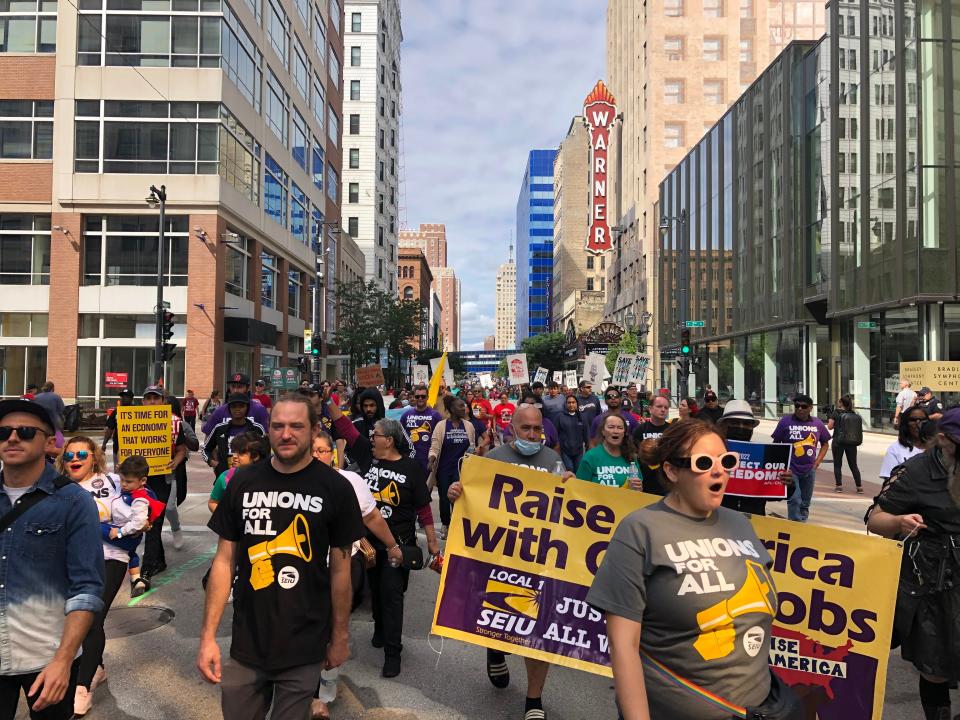 Hundreds of union members and workers march from Zeidler Union Square to Henry Maier Festival Park in solidarity with each other and to listen to President Biden speak.