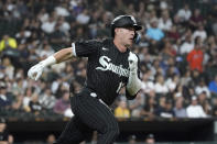 Chicago White Sox's Romy Gonzalez rounds first on a double off Houston Astros starting pitcher Framber Valdez during the third inning of a baseball game Wednesday, Aug. 17, 2022, in Chicago. (AP Photo/Charles Rex Arbogast)