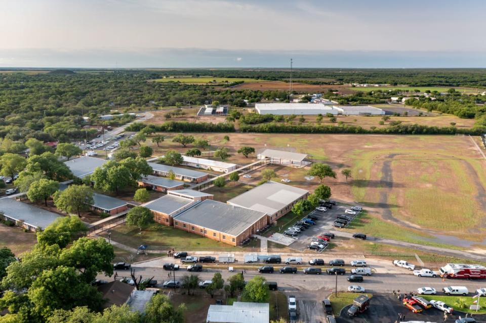 <div class="inline-image__caption"> <p>An aerial view of Robb Elementary School.</p> </div> <div class="inline-image__credit"> Jordan Vonderhaar/Getty </div>