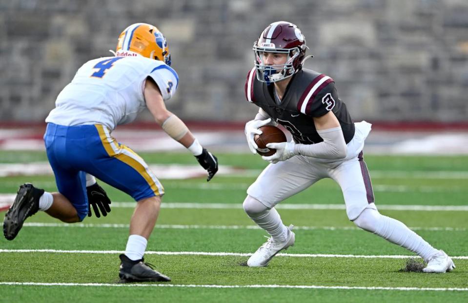 State College’s Ty Salazer cuts down the field with the ball from Downingtown East’s Paxon Warnock during the game on Friday, Sept. 1, 2023. Abby Drey/adrey@centredaily.com