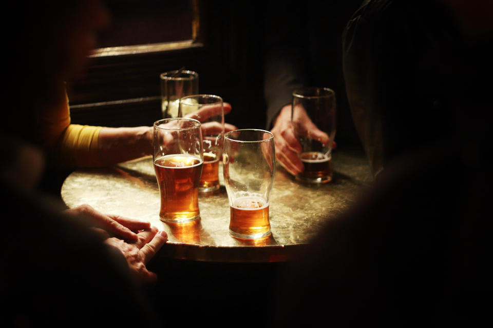 Pint glasses on a table in a pub