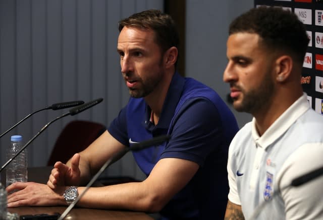 Kyle Walker, right, with Gareth Southgate 