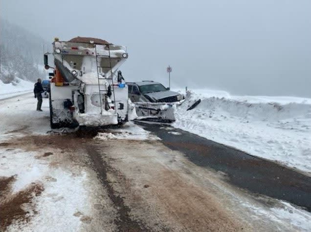 A vehicle crashed into a snowplow on a snowy Berthoud Pass