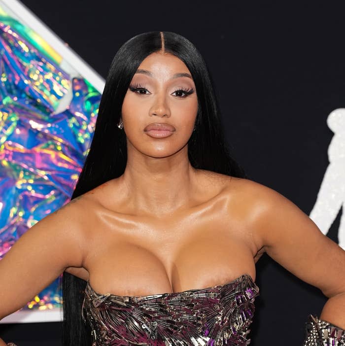 A closeup of Cardi B in a strapless outfit