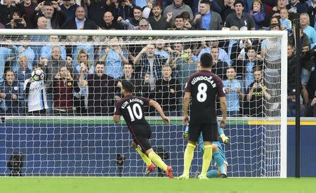 Britain Football Soccer - Swansea City v Manchester City - Premier League - Liberty Stadium - 24/9/16 Manchester City's Sergio Aguero scores their second goal from the penalty spot Reuters / Rebecca Naden Livepic