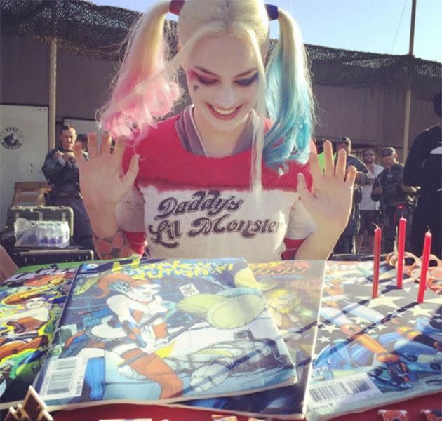 Margot Robbie as Harley Quinn wit Harley Quinn cake. Source: Instagram