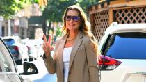 <p>Brooke Shields says hello to photographers on July 26 in N.Y.C. </p>