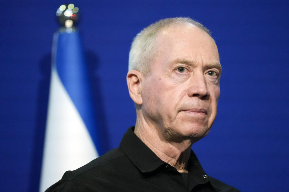 Israeli Defense Minister Yoav Gallant pauses while making a brief statement to the media with U.S. Secretary of State Antony Blinken, not pictured, at The Kirya, Israel's Ministry of Defense, Monday, Oct. 16, 2023, in Tel Aviv. The chief prosecutor of the International Criminal Court said Monday, May 20, 2024, he is seeking arrest warrants for Israeli and Hamas leaders, including Israeli Prime Minister Benjamin Netanyahu, in connection with their actions during the seven-month war between Israel and Hamas. Netanyahu, his defense minister Gallant, and three Hamas leaders, are believed to be responsible for war crimes and crimes against humanity in the Gaza Strip and Israel. (AP Photo/Jacquelyn Martin, Pool, File)