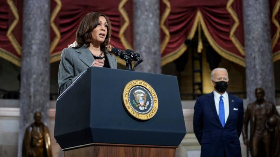 U.S. President Joe Biden listens as Vice President Kamala Harris delivers remarks on the one year anniversary of the January 6 attack on the U.S. Capitol, during a ceremony in Statuary Hall at the U.S. Capitol on January 06, 2022 in Washington, DC. (Photo by Drew Angerer/Getty Images)