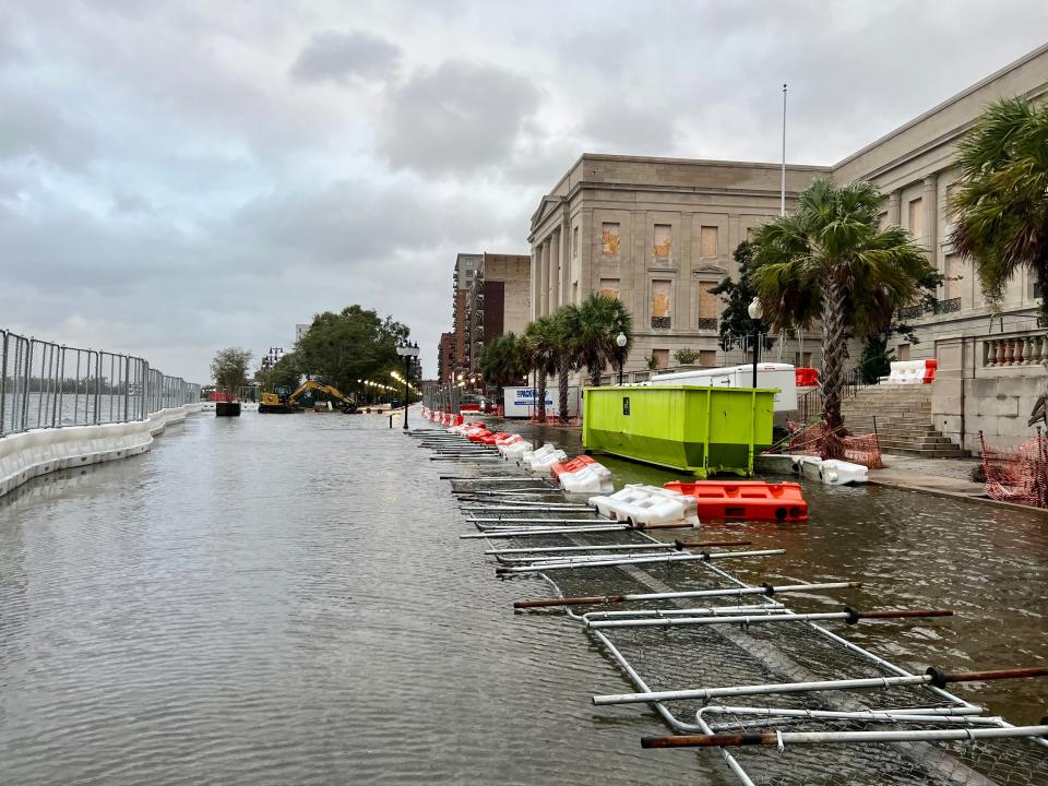 Water Street is flooded in front of the Alton Lennon Federal Building in downtown Wilmington.