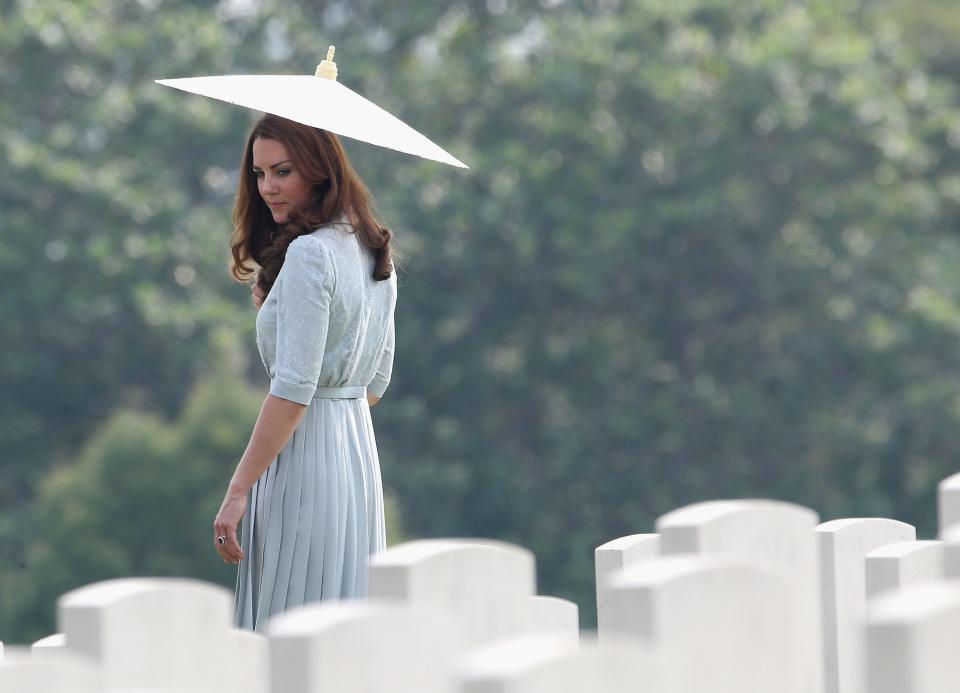 Kate Middleton visits a cemetery in Singapore.