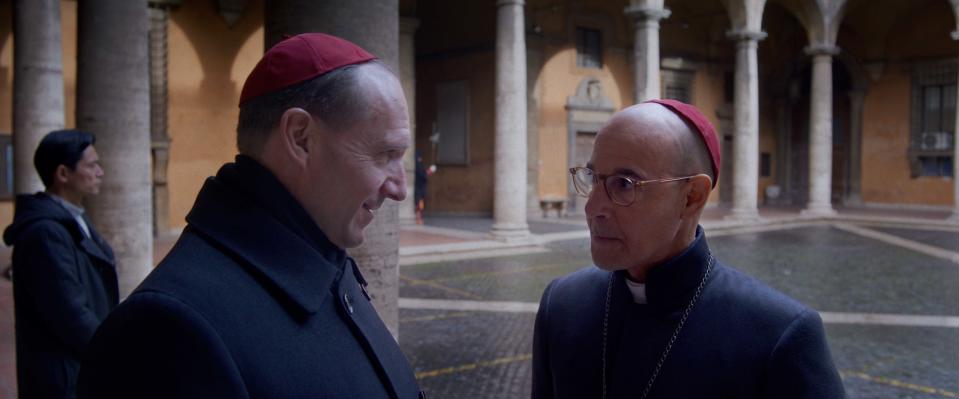 (L to R) Ralph Fiennes as Cardinal Lawrence and Stanley Tucci as Cardinal Bellini in director Edward Berger's CONCLAVE, a Focus Features release. Credit: Courtesy of Focus Features. Â© 2024 All Rights Reserved.