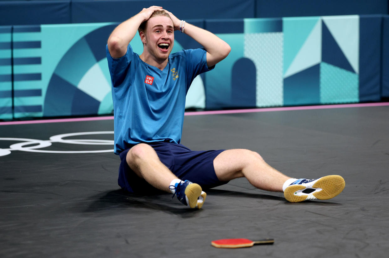 PARIS, FRANCE - JULY 31: Truls Moregard of Team Sweden reacts during the Men's Singles Round of 32 match between Chuqin Wang of Team People’s Republic of China and Truls Moregard of Team Sweden on day five of the Olympic Games Paris 2024 at South Paris Arena on July 31, 2024 in Paris, France. (Photo by Jared C. Tilton/Getty Images)