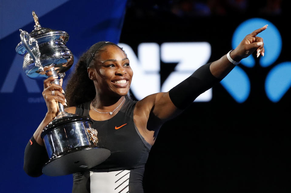FILE - Serena Williams holds her trophy after defeating her sister Venus during the women's singles final at the Australian Open tennis championships in Melbourne, Australia, Saturday, Jan. 28, 2017. Serena Williams says she is ready to step away from tennis after winning 23 Grand Slam titles, turning her focus to having another child and her business interests. “I’m turning 41 this month, and something’s got to give,” Williams wrote in an essay released Tuesday, Aug. 9, 2022, by Vogue magazine. (AP Photo/Dita Alangkara, File)