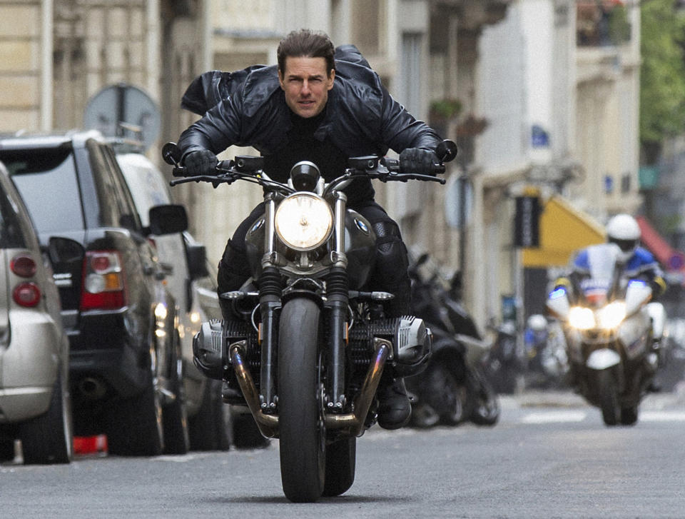 This image released by Paramount Pictures shows Tom Cruise in a scene from "Mission: Impossible - Fallout," the sixth film in the Mission Impossible franchise. Paramount Pictures on Monday halted production on the seventh “Mission: Impossible” film due to the Coronavirus outbreak, as Hollywood began to more drastically adapt to the growing epidemic. (Chiabella James/Paramount Pictures and Skydance via AP)