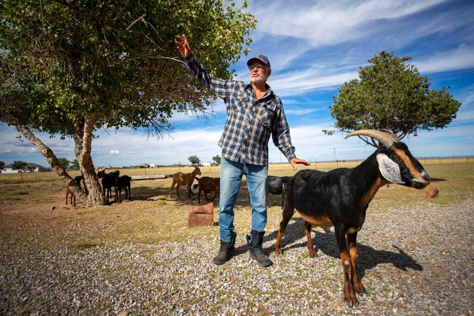 Bill Mendenhall, a corrections officer and registered Republican, speaks to the Associated Press at his ranch in Estancia, N.M., Sept. 29, 2022.  Mendenhall said anger still smolders in the community over the outcome of the 2020 presidential election. Trump won two-thirds of the vote in Torrance County.