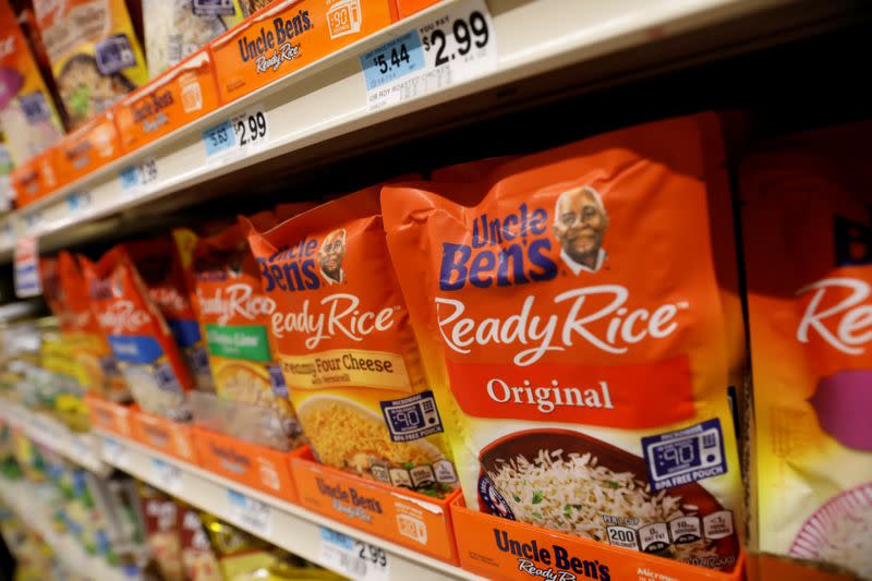 Boxes of Uncle Ben's branded rice stand on a store shelf inside of a shop in the Brooklyn borough of New York City