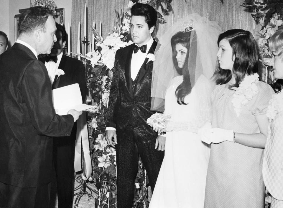 <p>We can't talk about Vegas weddings without noting the couple that made it cool in the first place. The King and his queen tied the knot at the Aladdin Hotel (now known as Planet Hollywood). Priscilla's younger sister, <a href="https://www.countryliving.com/life/entertainment/g4358/elvis-and-priscilla-presley-wedding/" rel="nofollow noopener" target="_blank" data-ylk="slk:Michelle Beaulieu" class="link ">Michelle Beaulieu</a>, served as her maid of honor. </p>