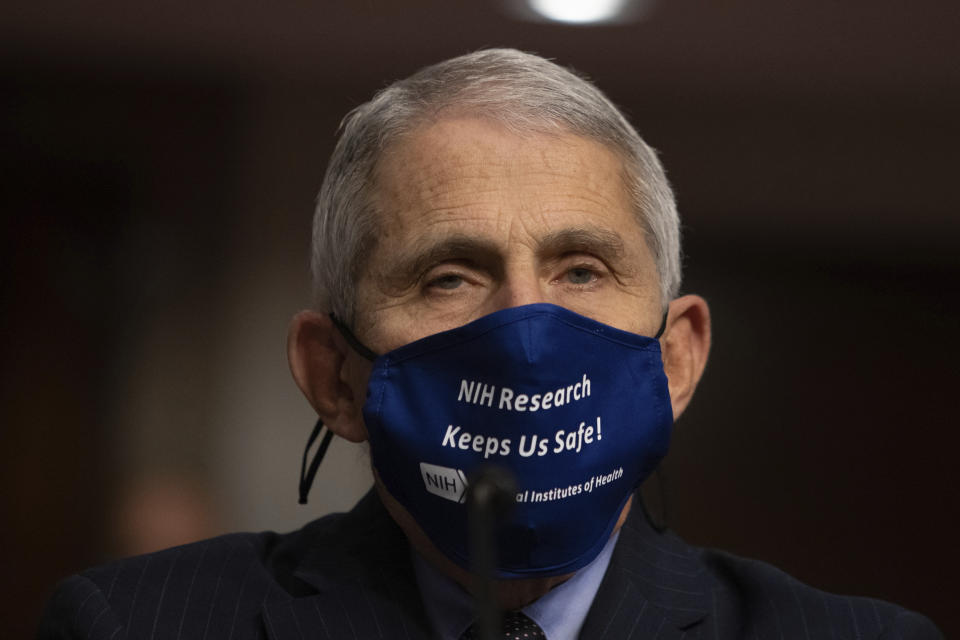 Dr. Anthony Fauci, Director of the National Institute of Allergy and Infectious Diseases at the National Institutes of Health, listens during a Senate Senate Health, Education, Labor, and Pensions Committee Hearing on the federal government response to COVID-19 Capitol Hill on Wednesday, Sept. 23, 2020, in Washington. (Graeme Jennings/Pool via AP)