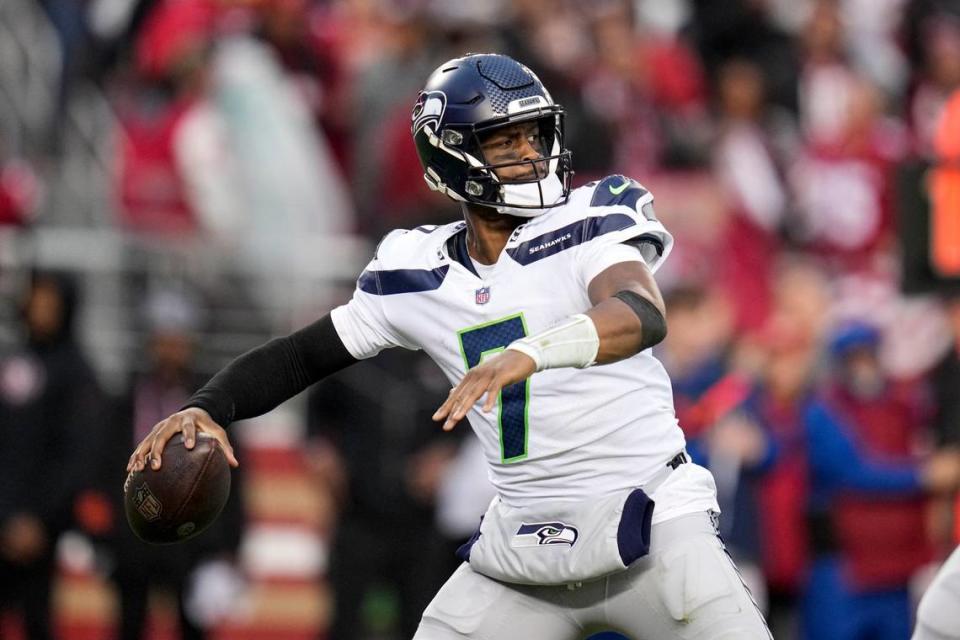 Seattle Seahawks quarterback Geno Smith (7) passes against the San Francisco 49ers during the second half of an NFL wild card playoff football game in Santa Clara, Calif., Saturday, Jan. 14, 2023. (AP Photo/Godofredo A. Vásquez)