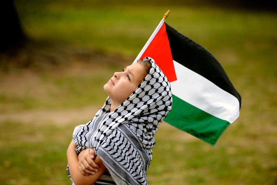 Seven year old, Kenzi Isamail of Iselin, NJ,  at the Al-Awda, The Palestine Right To Return Coalition rally to raise awareness about the plight of Palestinians in Gaza and to raise donations for the Gaza Community Mental Health Program, August 30, 2014.