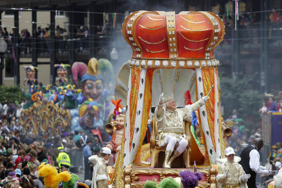 FILE - In this March 8, 2011 file photo, Rex, the King of Carnival rides in the Krewe of Rex as he arrives at Canal St. on Mardi Gras day in New Orleans. With the Super Bowl in New Orleans Feb. 3 and Mardi Gras falling just nine days later, the city is gearing up for a massive celebration and influx of tourists that locals are calling "Super Gras." (AP Photo/Gerald Herbert, file)