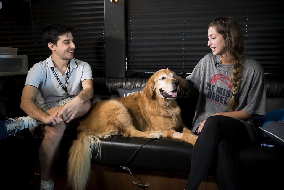 Sam Levine interviews Julia Tatum&nbsp;while her dog Bentley sits on the couch with them inside the HuffPost tour bus.