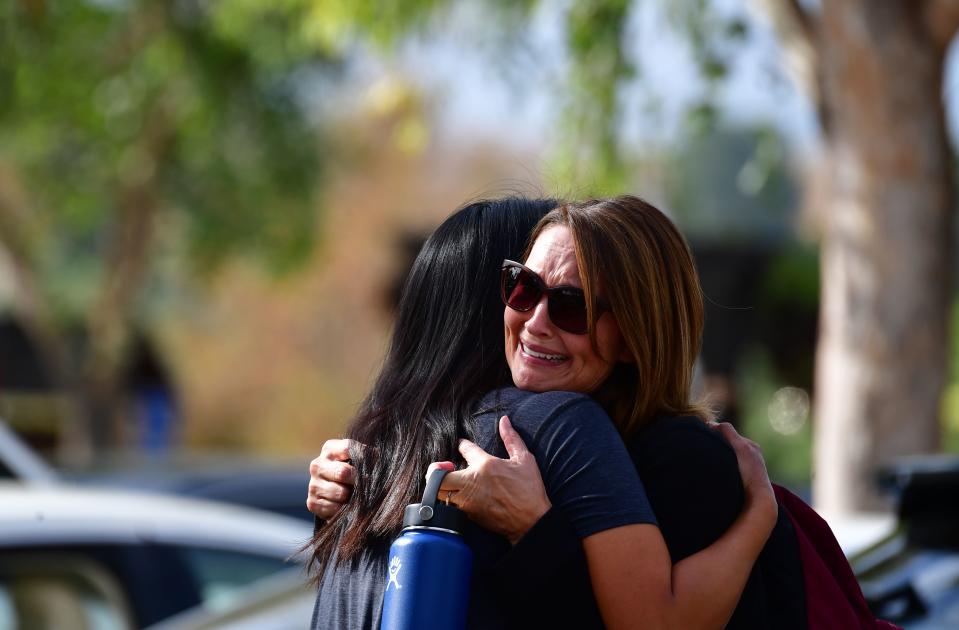 Women embrace in Central Park after a shooting at Saugus High School in Santa Clarita, California on Nov. 14, 2019. (Photo: Frederic J. Brown/AFP via Getty Images)