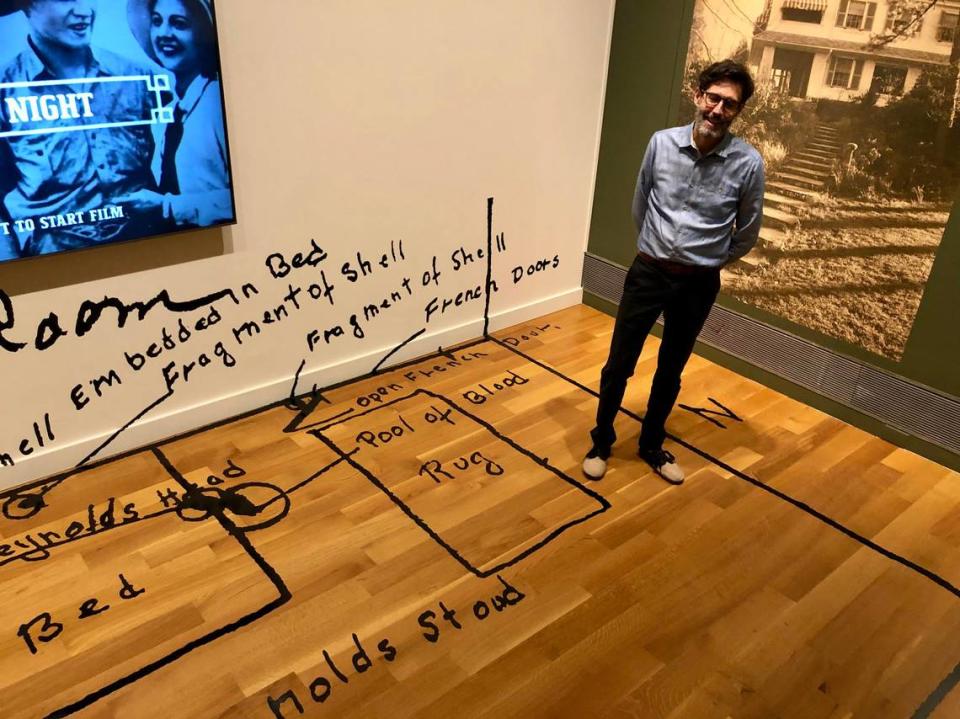 Phil Archer, deputy director of Reynolda House Museum of American Art, stands inside a life-sized enlargement of a sketch the sheriff made during his investigation of Z. Smith Reynolds’ fatal 1932 shooting. The sketch and other items from the museum’s archives are included in “Smith & Libby,” an exhibit on the unsolved mystery of the shooting, which happened on an upstairs porch of the house. 