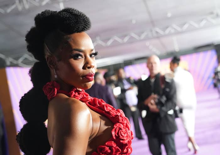 closeup of brandee on the red carpet in a floral dress