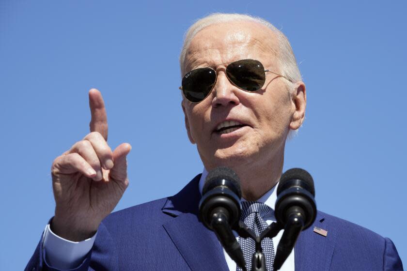 President Joe Biden speaks about an agreement to provide Intel with up to $8.5 billion in direct funding and $11 billion in loans for computer chip plants in Arizona, Ohio, New Mexico and Oregon, Wednesday March 20, 2024, in Chandler, Ariz., at the Intel Ocotillo Campus. (AP Photo/Jacquelyn Martin)