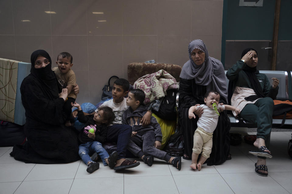 Palestinians take shelter in the Nasser hospital during ongoing Israeli bombardment in Khan Younis, Gaza Strip, Friday, Oct. 27, 2023. (AP Photo/Fatima Shbair)
