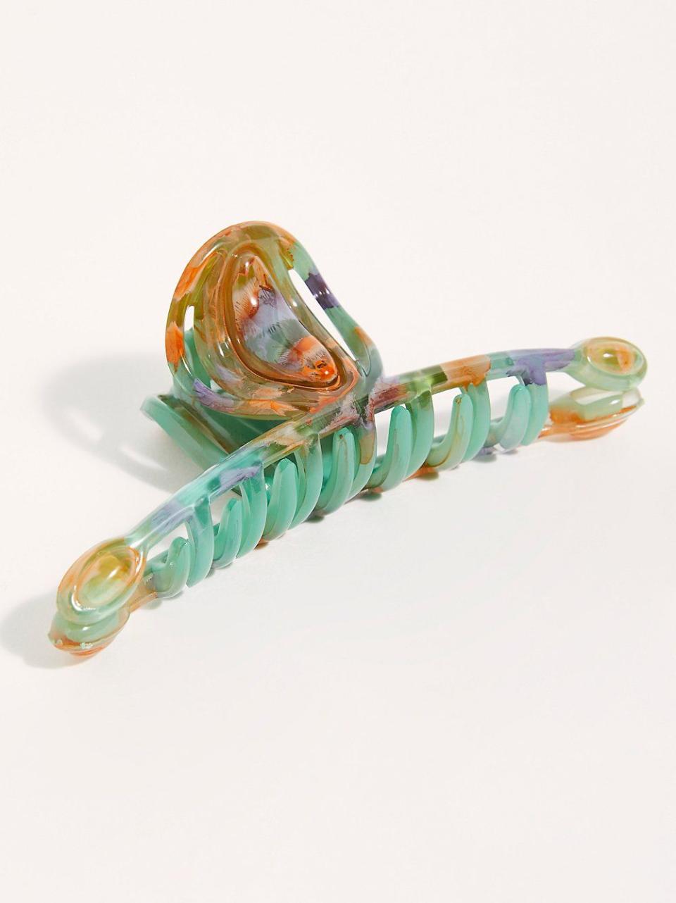 <p>freepeople.com</p><p><strong>$24.00</strong></p><p>Hair accessories are essential to keeping hairstyles fresh and modern. Retro style hair claws are all the rage right now, so this colorful accessory from Free People is sure to be a hit. It has dozens of positive reviews from customers who appreciated how it's sturdy enough to hold fine hair in place, while also appearing delicate enough to match with many different outfits.</p>