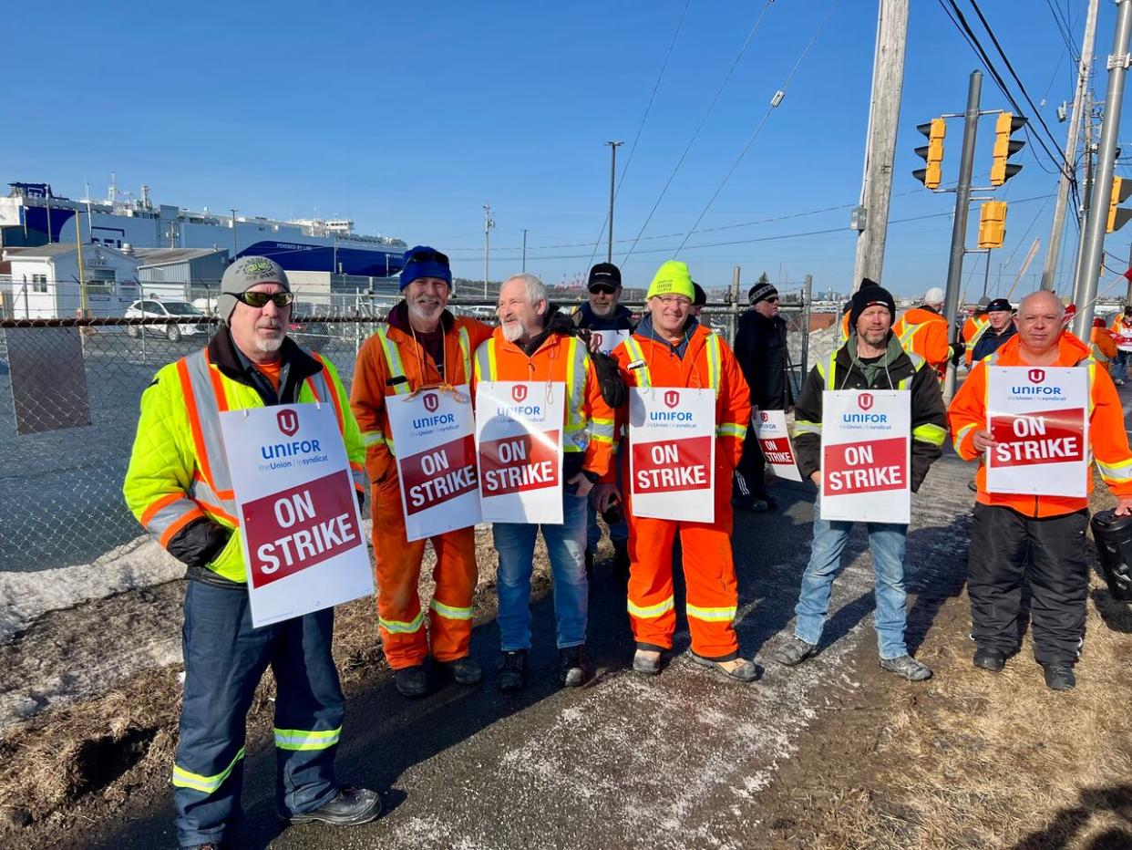 Autoport workers are shown on Feb. 27 after going on strike.  (Paul Palmeter/CBC - image credit)