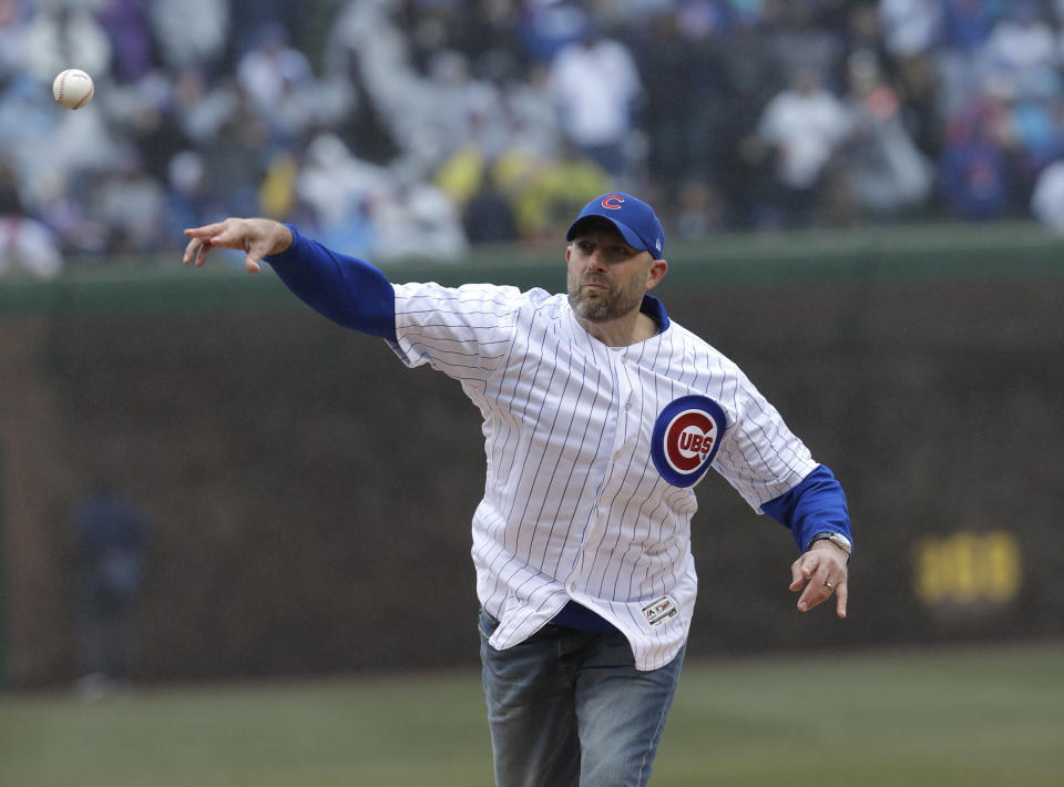 Chicago Bears head coach Matt Nagy throws the first pitch before Saturday’s Cubs-Braves game at Wrigley Field. The Cubs would scored 11 unanswered runs after Nagy’s seventh-inning stretch performance. (AP)