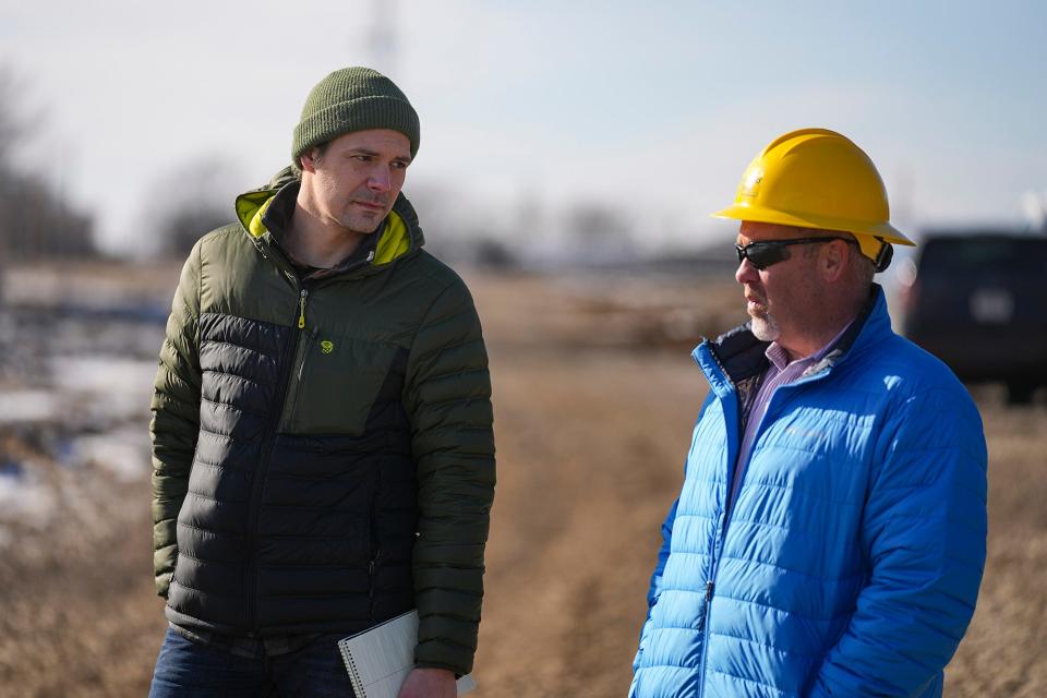 IndyStar environment reporter Karl Schneider tours a solar farm Wednesday, Feb. 1, 2023, in Danville, Ind.