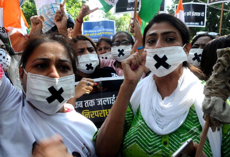 Members of the Congress women’s wing protest against the alleged rape, murder and forceful cremation of a nine-year-old girl in Delhi (Anadolu Agency via Getty Images)