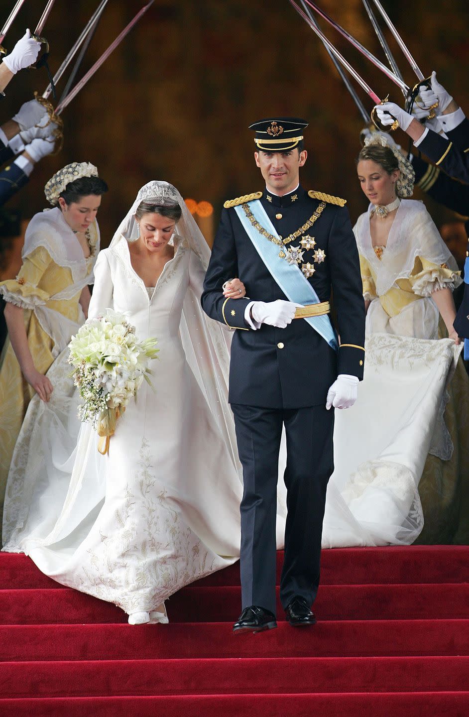 <p>Letizia and Felipe descended the staircase looking regal at Madrid's Almudena Cathedral on their wedding day.</p>