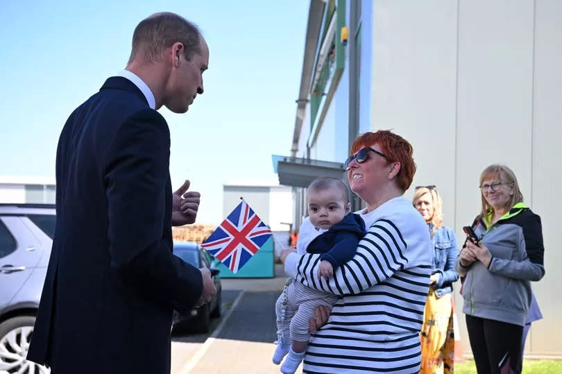 William chats to wellwisher Andrea Newton and her grandson Luca -Credit:Getty Images